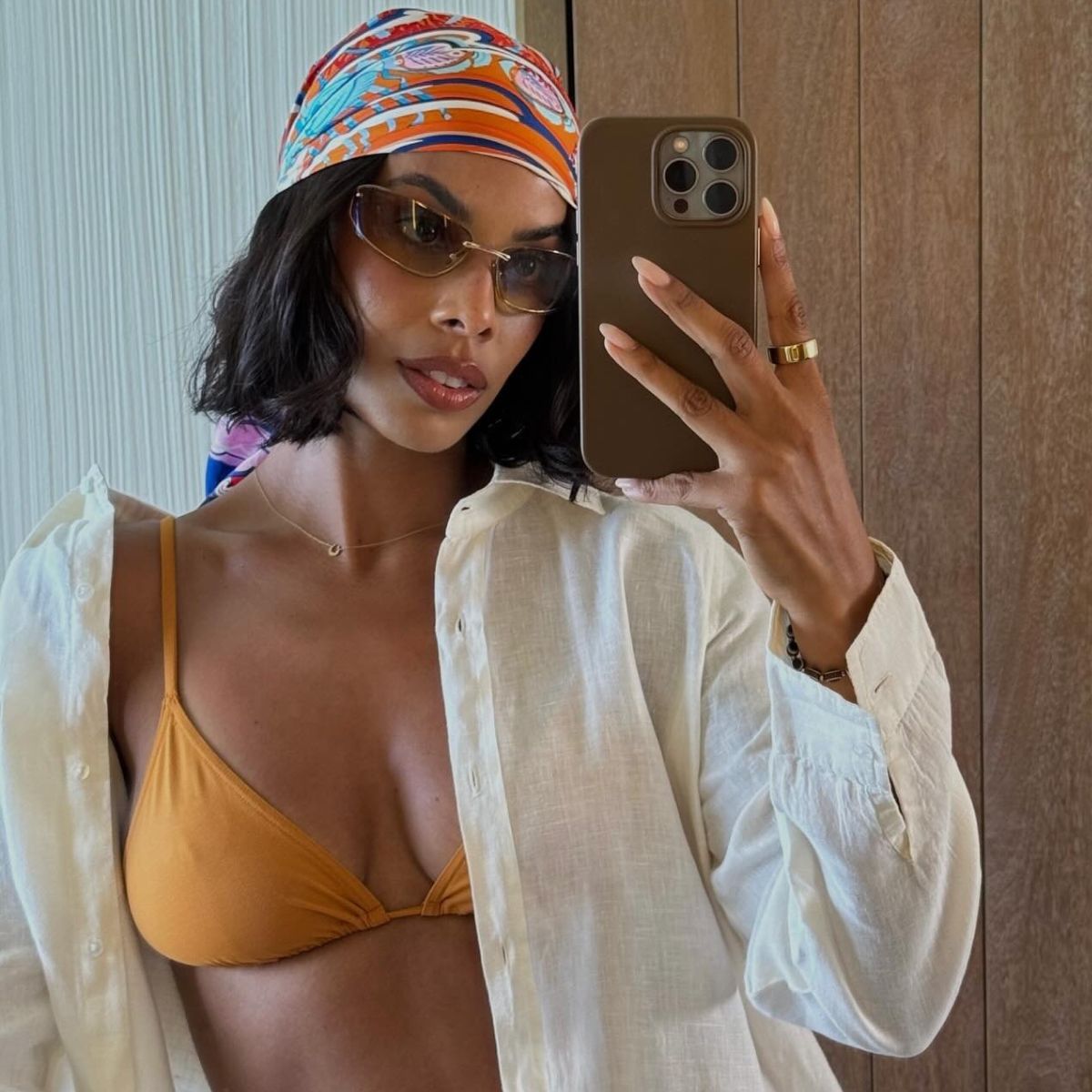 Rochelle Humes taking a mirror selfie on holiday in a bikini top with a beachy bob hairstyle