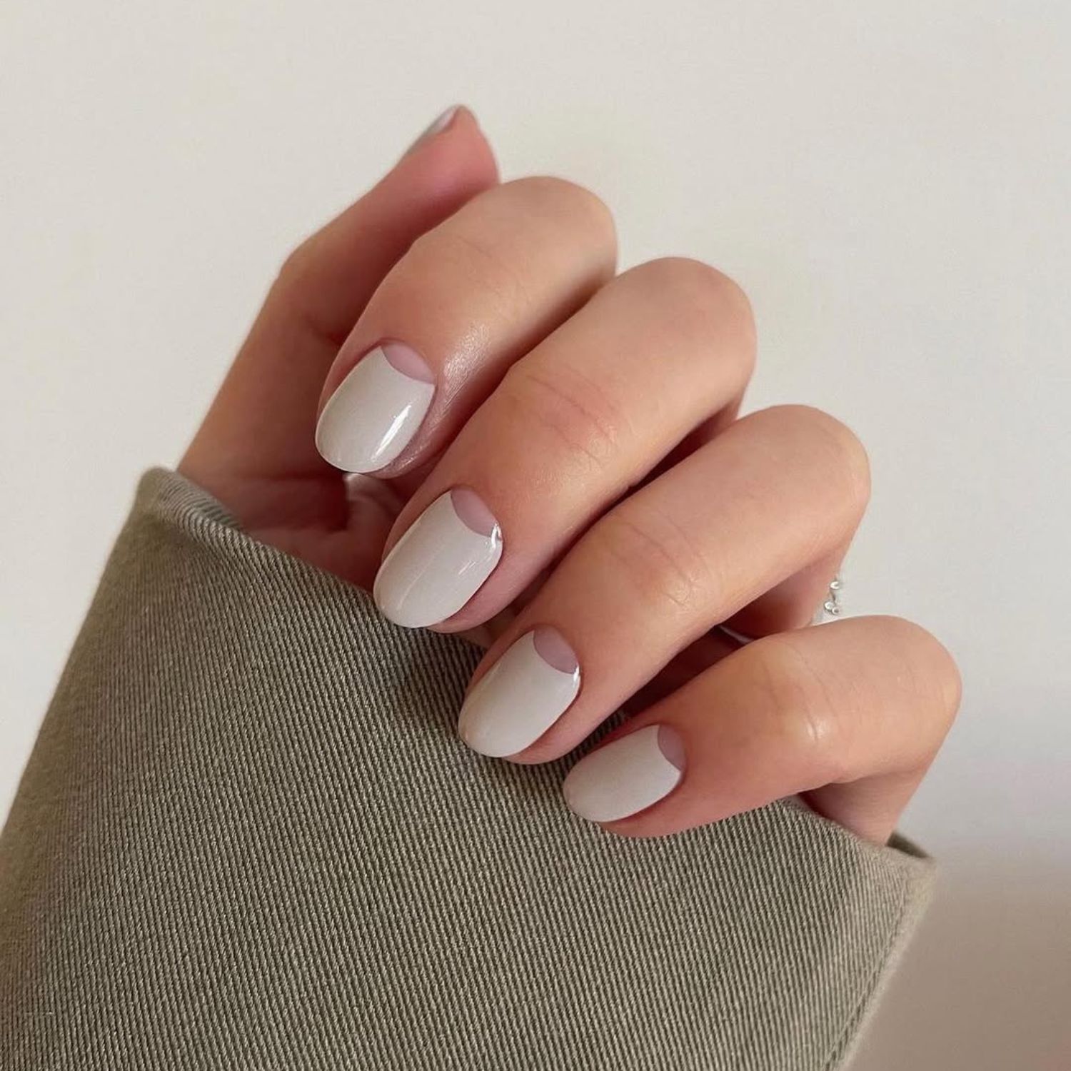 Half moon manicure in nude polish