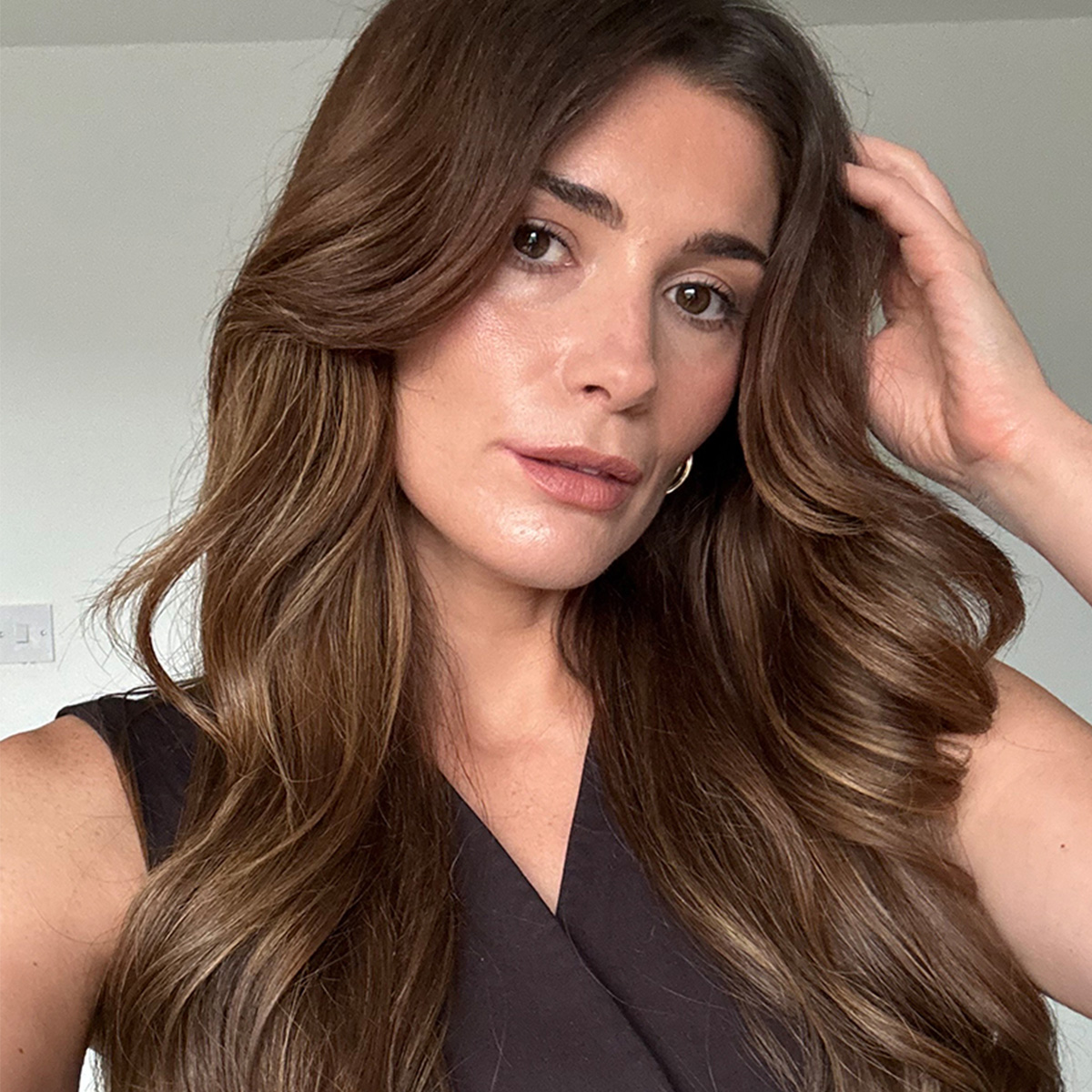 beauty editor Eleanor with loose waves hairstyle